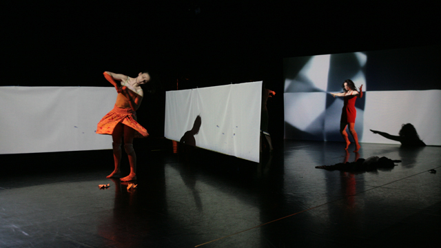 Theodorou and Warner do a run-through to sync their timing with the projection elements