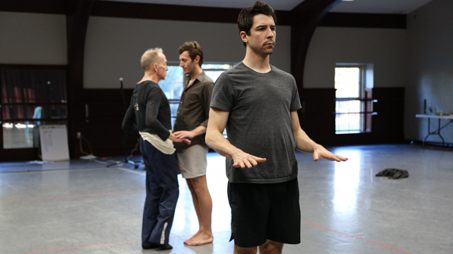 Peter Musante rehearses with Peter Schmitz and Simon Courchel in the background.