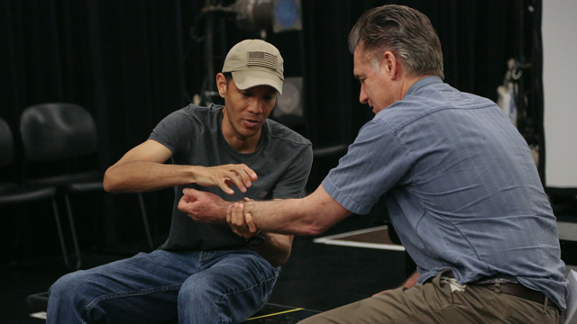 FSU student veteran Will Beachem demonstrates medical procedures with Bill Pullman