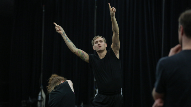 Chris Schlichting watches Maggie Zepp and Tristan Koepke in rehearsal