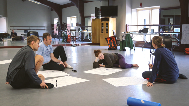 Chis Schlichting and collaborators in conversation during rehearsal