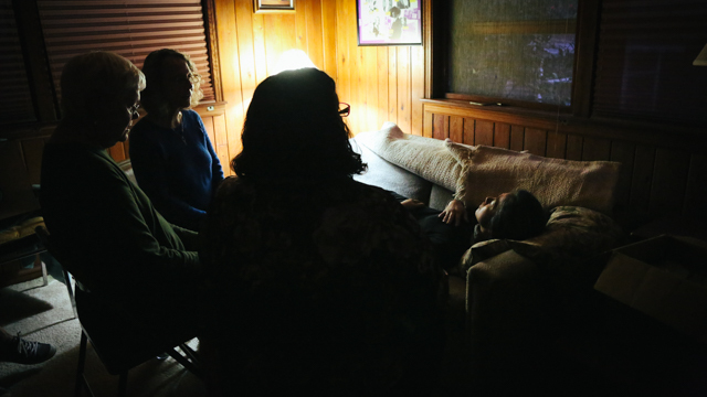 The group gathers to sing songs of comfort and joy to those “at the thresholds of life.”