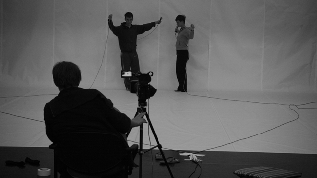 Olive Bieringa and Otto and Emmett Ramstad rehearse <i>Symptom</i>.