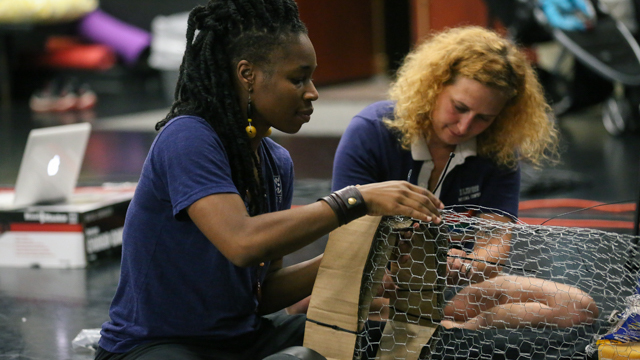 Forté-Saunders works on a set piece with Nadia Tykulsker