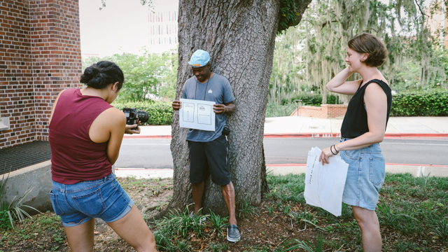 Jessica Juachon photographing Farai Malianga with Londs Reuter on her project