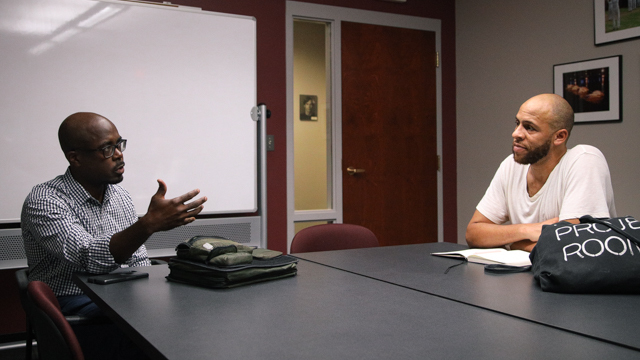 Assistant Professor of Creative Writing and African-American Narratives, Ravi Howard, and Will Rawls<br>engage in conversation during an Entrypoint