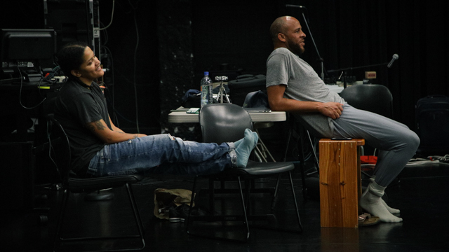 Kemi Adeyemi and Will Rawls observe their collaborators rehearsing