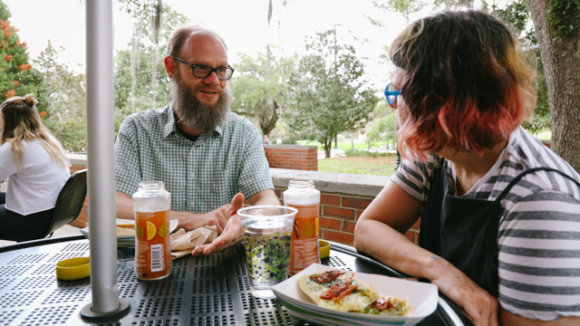 Graney speaking with FSU Professor of Psychology, Dr. Walter Boot