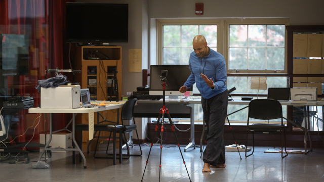 Darrell Jones works through movement material in the studio