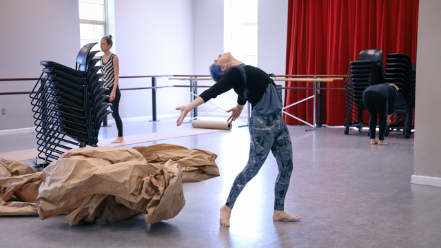 Alyssa Baguss, Van Loon, and Van Wieren engaged in process in the studio