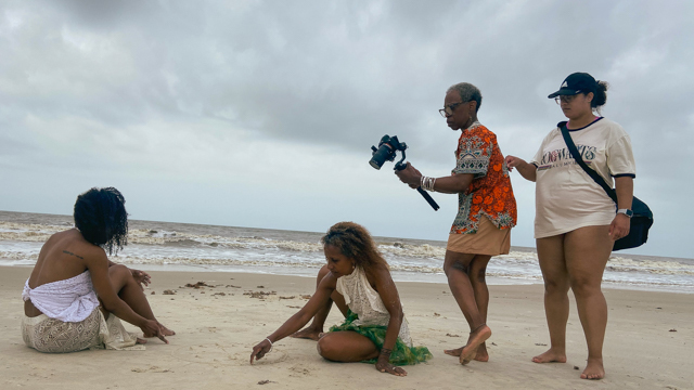 Haynes films Love-Roney and love at Cape San Blas with Production Assistant Ashlee Hubert