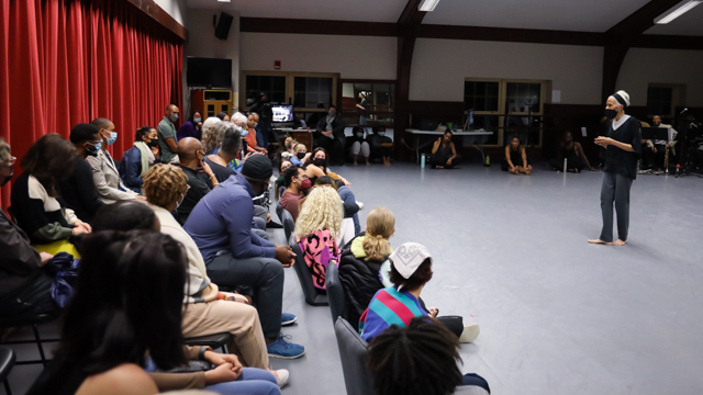 Ms. McIntyre speaks with those in attendance for the work-in-progress showing