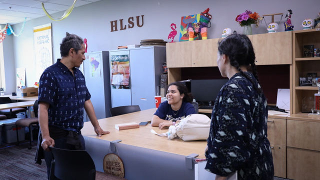 Mazatl and Kajiyama meet with a representative of the Hispanic/Latinx Student Union