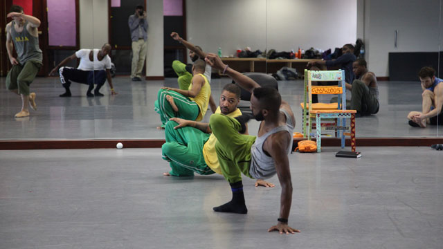 Jeremy Neal explores a phrase in rehearsal with Abraham